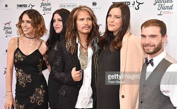 A picture of Steven Tyler with his children.